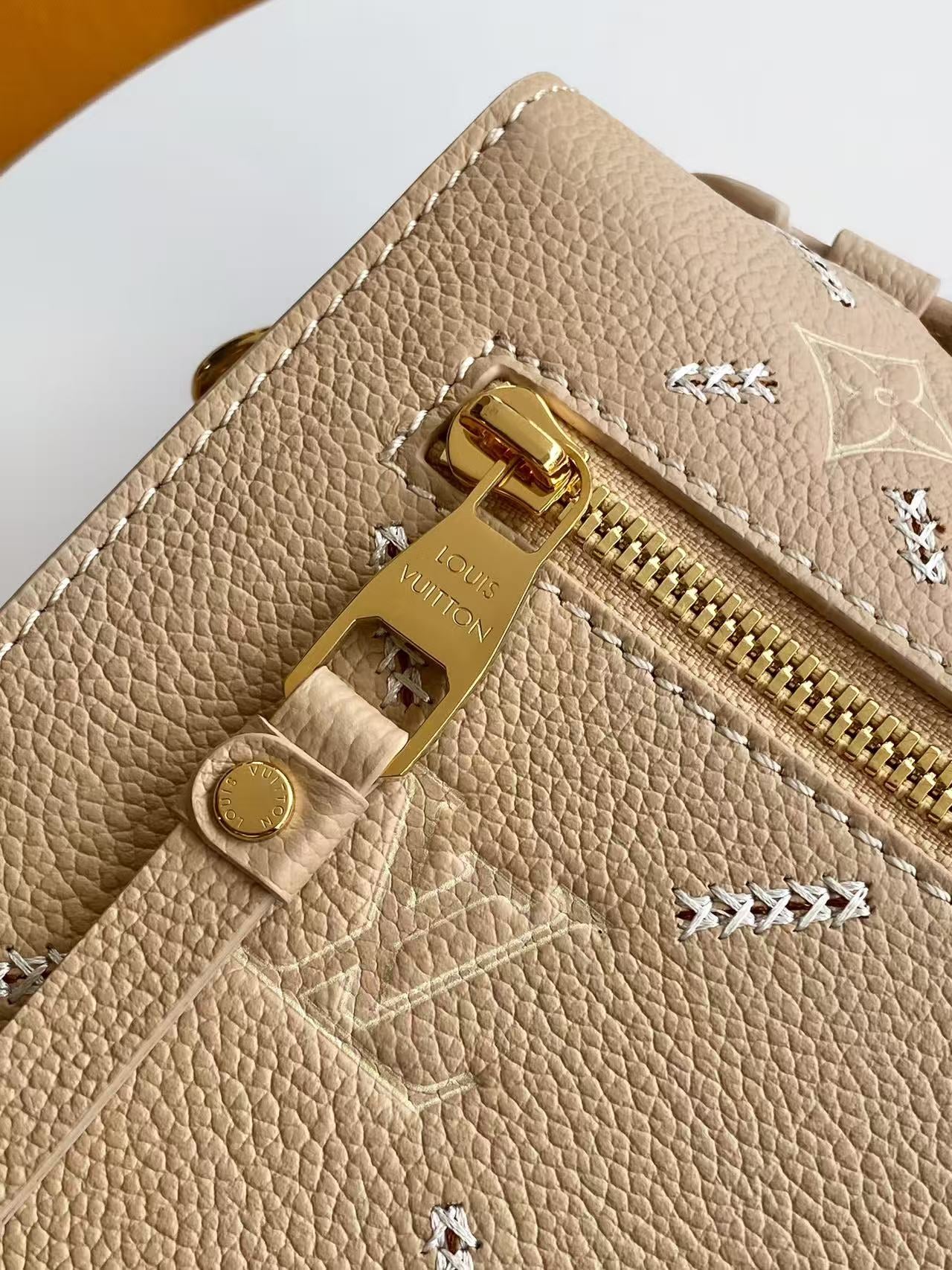 Louis Vuitton Pochette Métis - Monogram Empreinte Leather