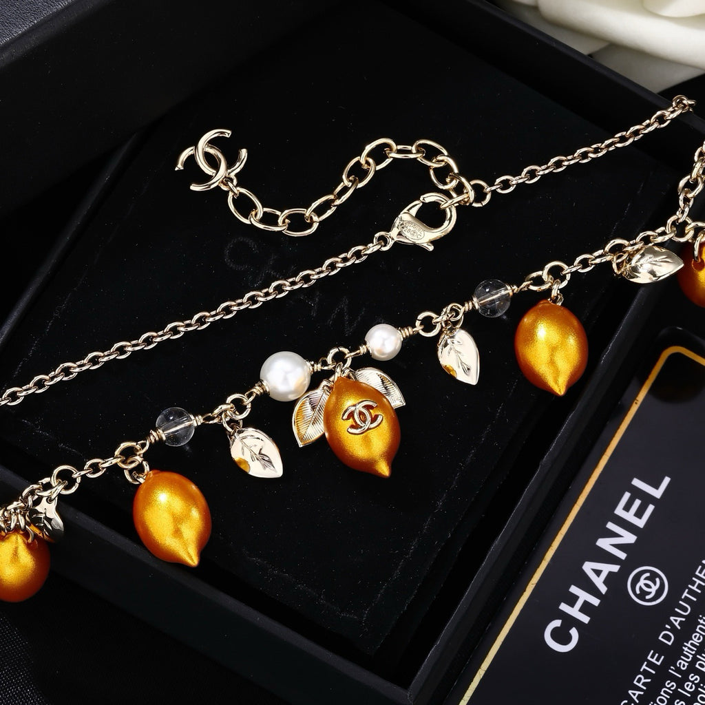 Chanel Mediterranean Matte Gold Lemon Pearl Charm Statement Necklace