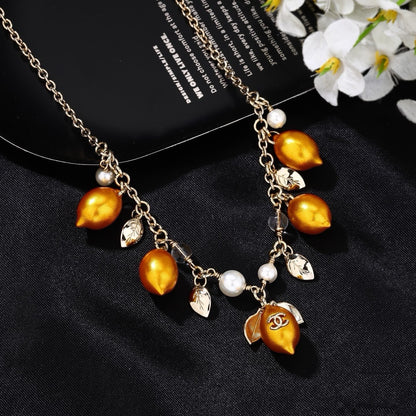 Chanel Mediterranean Matte Gold Lemon Pearl Charm Statement Necklace