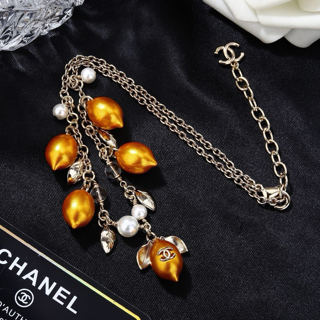 Chanel Mediterranean Matte Gold Lemon Pearl Charm Statement Necklace
