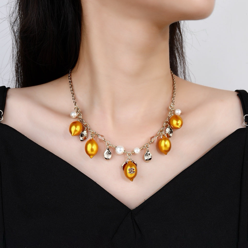 Chanel Mediterranean Matte Gold Lemon Pearl Charm Statement Necklace