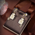 Chanel Iconic N°5 Perfume Bottle Mother-of-Pearl Enamel Rhinestone CC Charm Drop Earrings