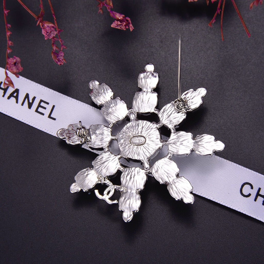 Chanel Winter Wonderland Silver Snowflake Opal-Effect Starburst CC Brooch