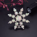 Chanel Winter Wonderland Silver Snowflake Opal-Effect Starburst CC Brooch