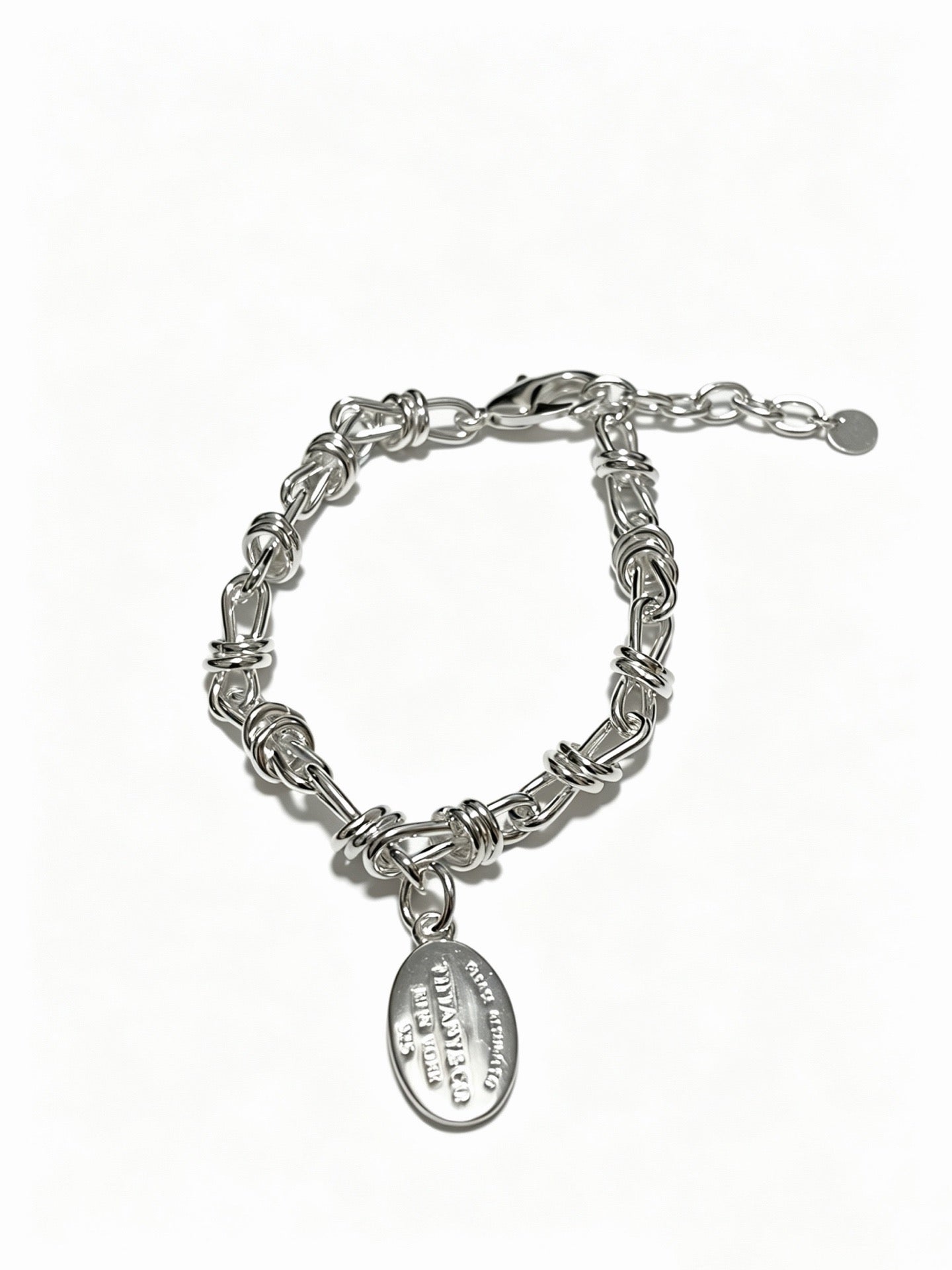 Tiffany & Co. Return to Tiffany Sterling Silver Knot Link Chain Oval Tag Bracelet