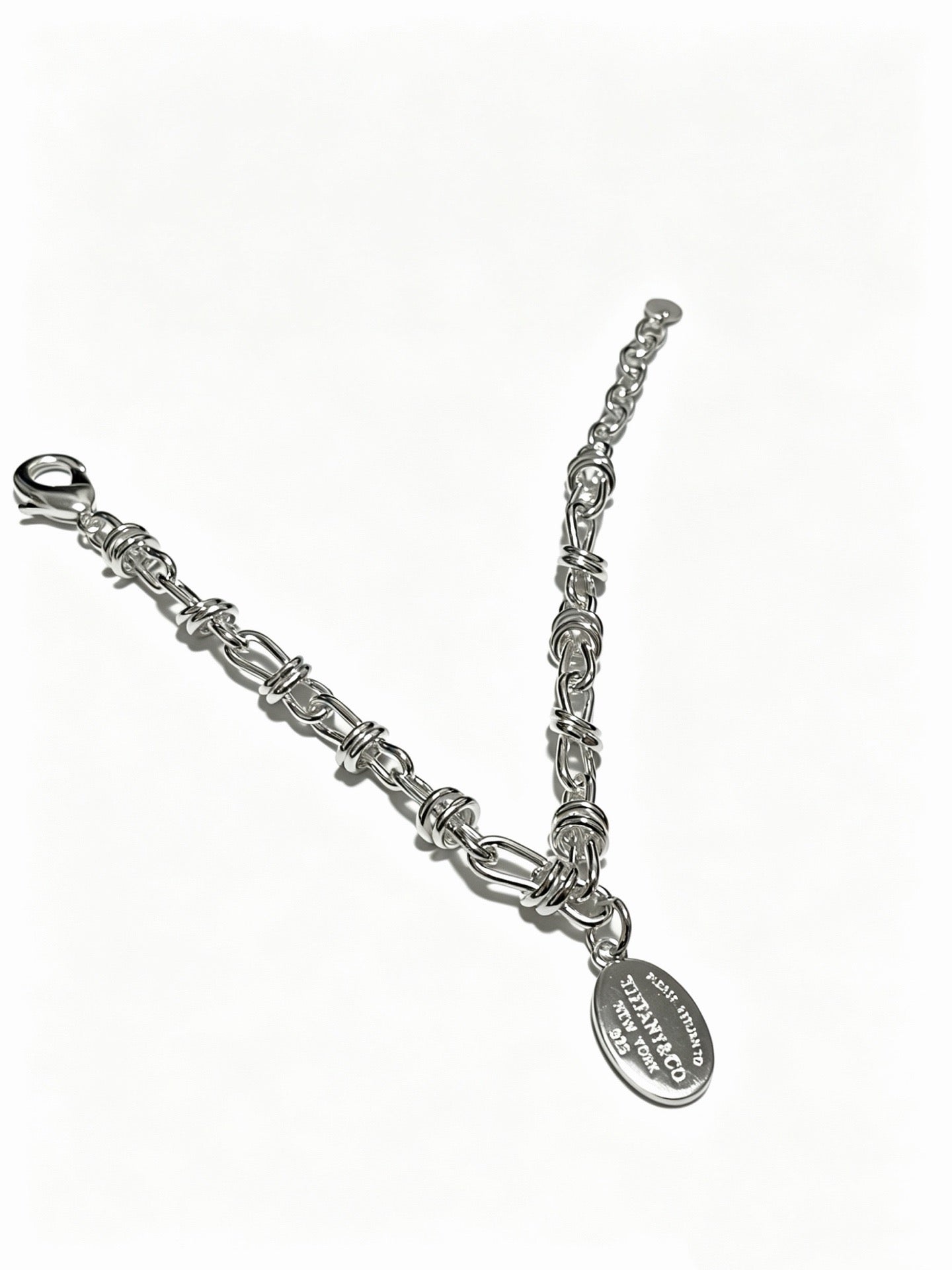 Tiffany & Co. Return to Tiffany Sterling Silver Knot Link Chain Oval Tag Bracelet