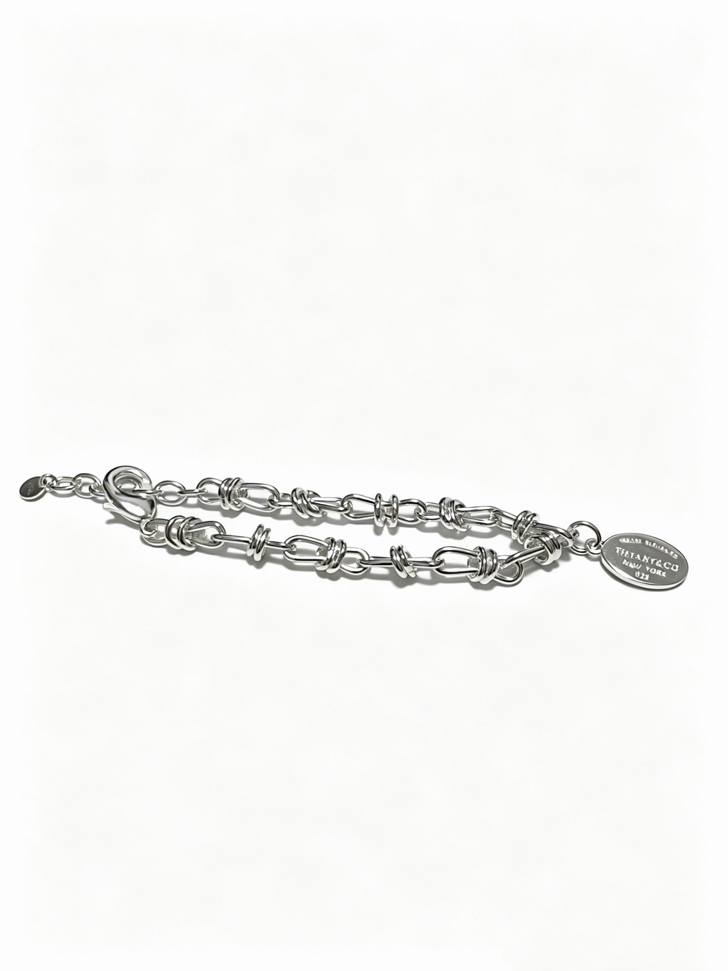 Tiffany & Co. Return to Tiffany Sterling Silver Knot Link Chain Oval Tag Bracelet