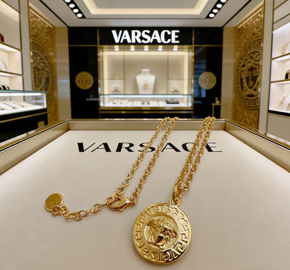 Versace Classic Tribute Gold Medusa Head Greca Round Pendant Necklace