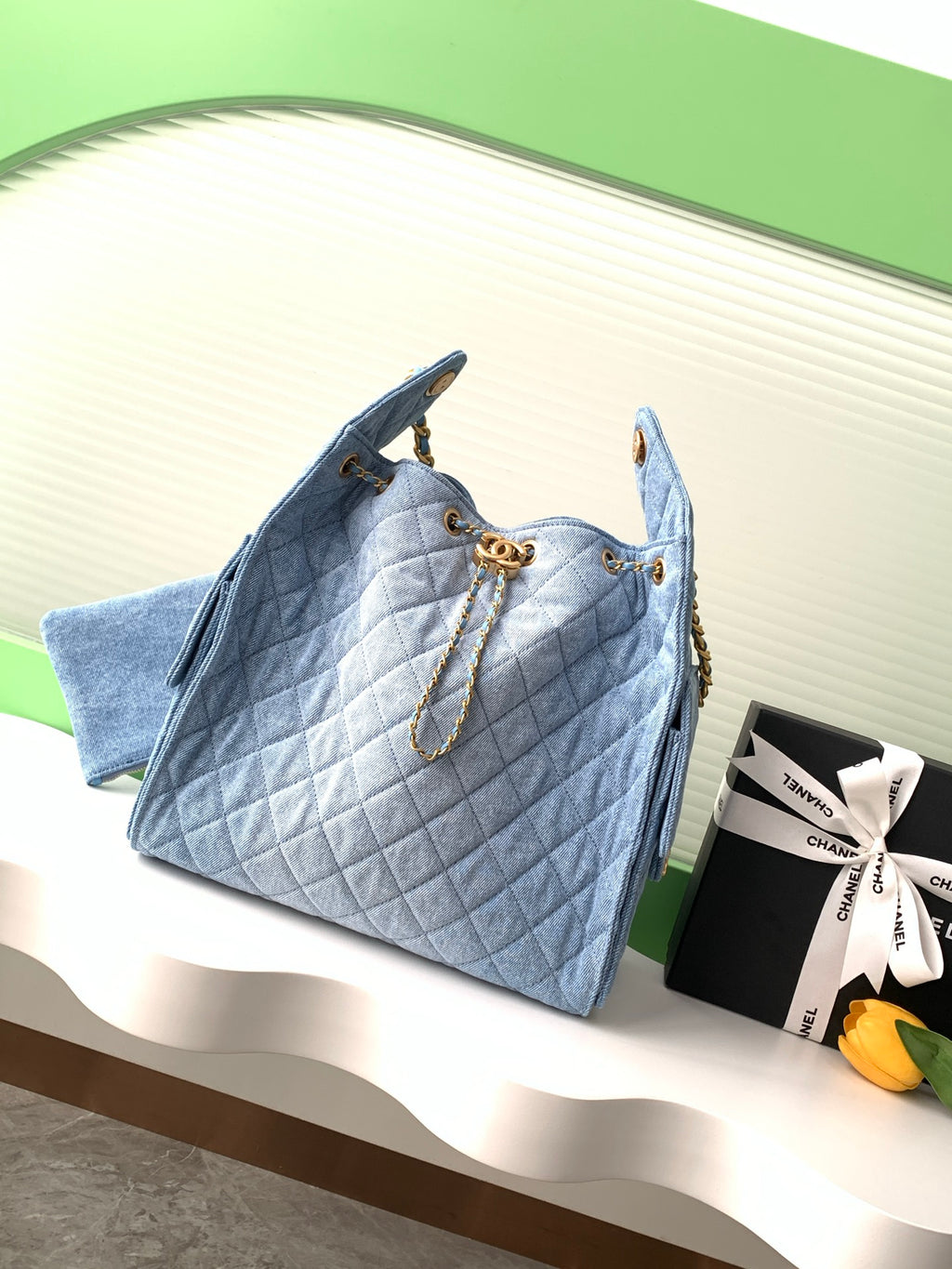 Chanel 25P Quilted Denim Drawstring Bucket Bag — Light Blue